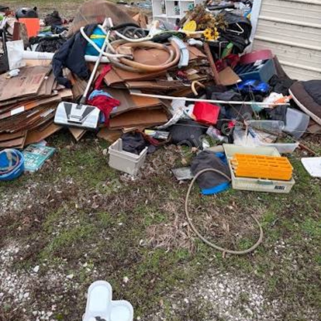 Old tires and garage clutter staged for pickup as part of a junk removal job in Laguna Woods, CA